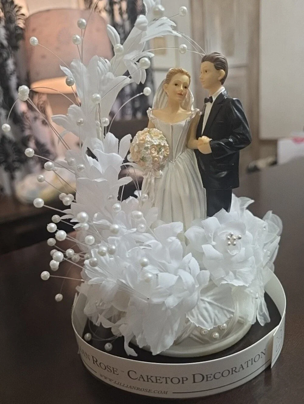 White Bride and Groom Wedding Cake Topper with Pearl Floral Accents